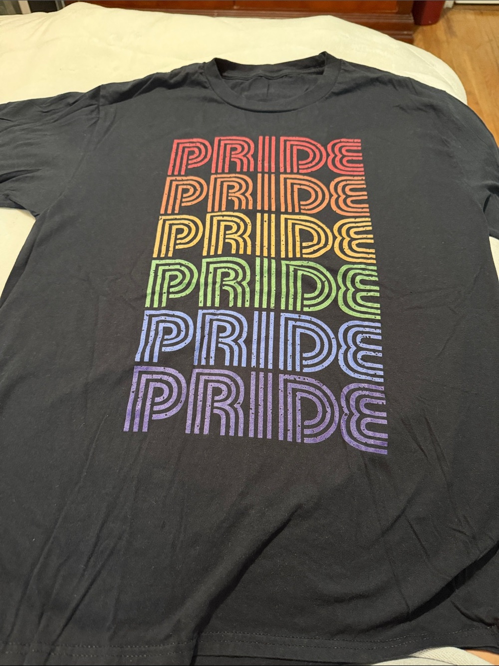 Black Men's Pride Graphic Tee with Rainbow Text